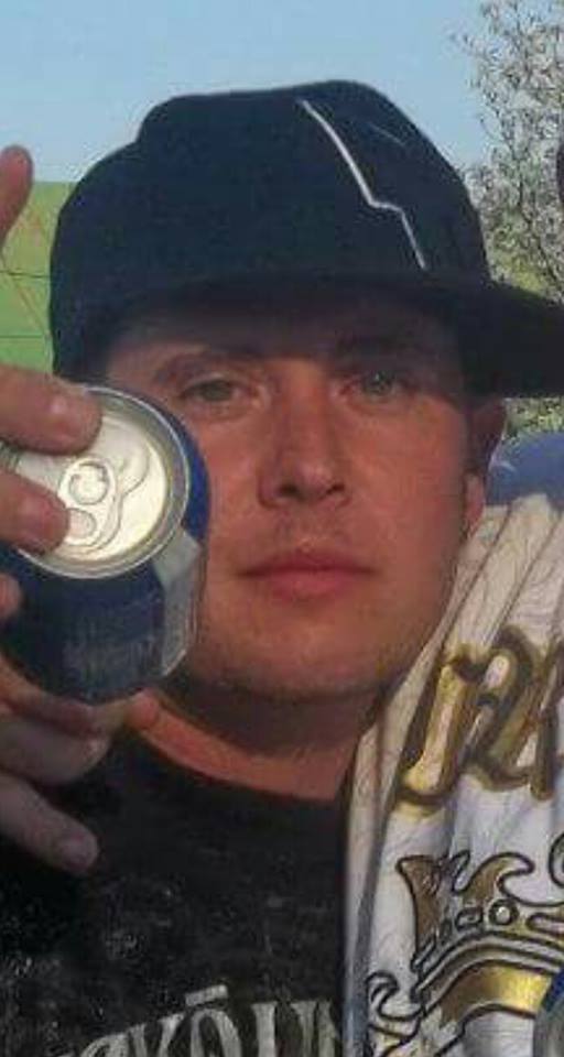 Robert Catlett III holding beer